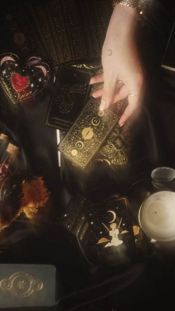 Gold tarot cards on the reading table